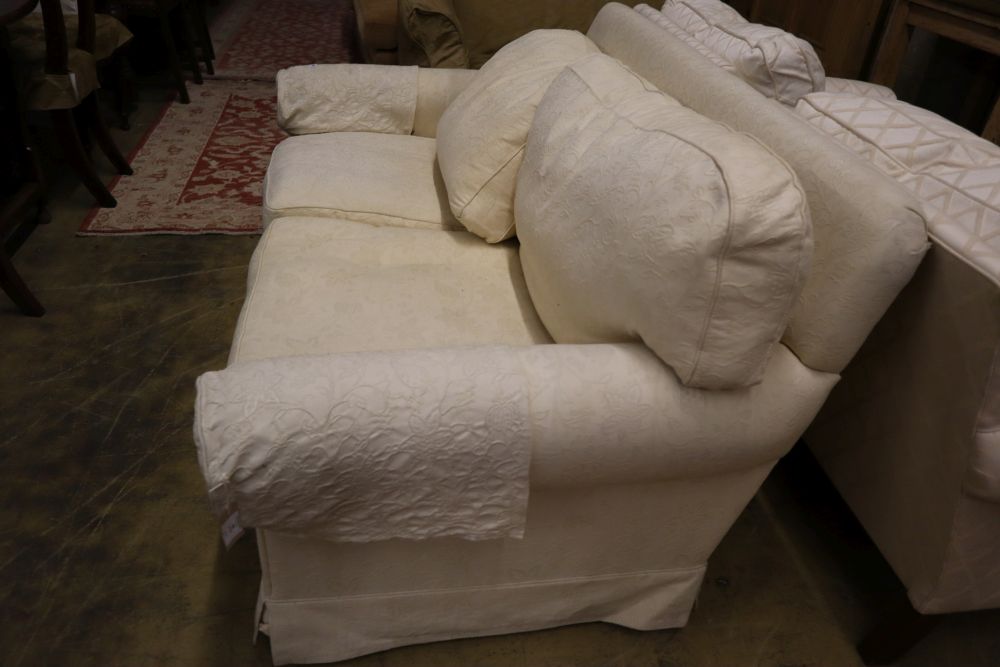 A contemporary cream brocade upholstered two seater settee, width 170cm depth 92cm height 86cm